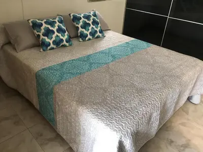 Cama o camas de una habitación en Monte Rojo San Agustin