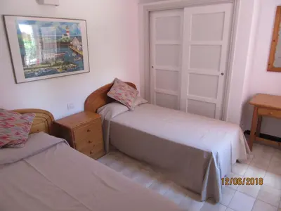 Cama o camas de una habitación en Bungalow Los Melocotones