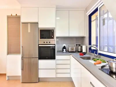 Una cocina o zona de cocina en Villa Feliz 44