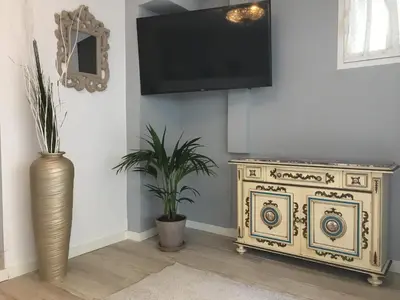 Una televisión o centro de entretenimiento en Casa Doramas VV