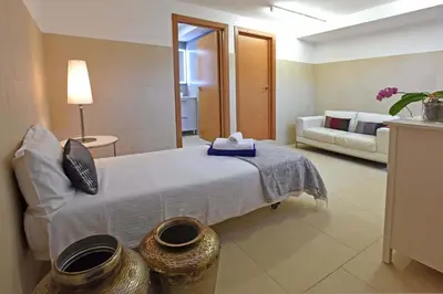 Cama o camas de una habitación en Salobre Golfers 6