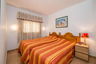 Cama o camas de una habitación en Cosy Corner Playa del Inglés