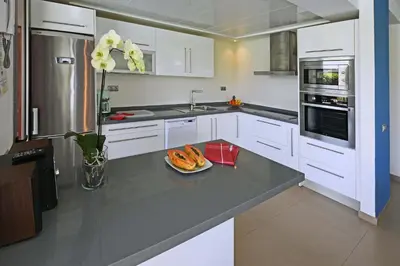 Una cocina o zona de cocina en Salobre Los Dragos 12