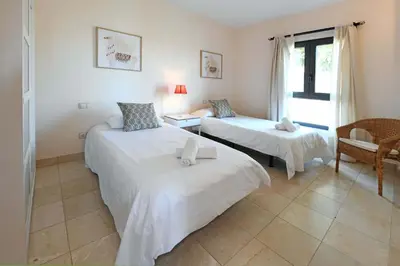Cama o camas de una habitación en Salobre Morro Golf 1
