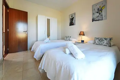 Cama o camas de una habitación en Salobre Morro Golf 3