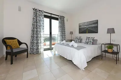 Cama o camas de una habitación en Salobre Morro Golf 5