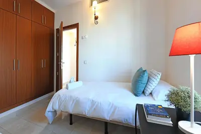 Cama o camas de una habitación en Salobre Morro Golf 7