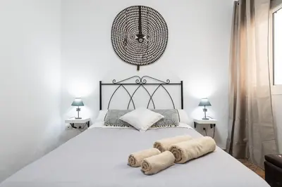 Cama o camas de una habitación en Arinaga Luxury House Beach
