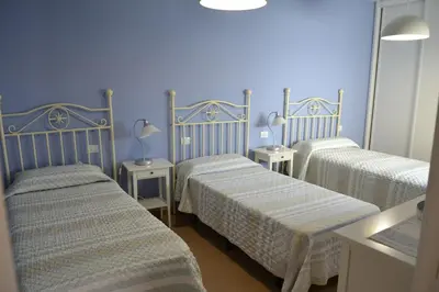 Cama o camas de una habitación en Ático San Miguel