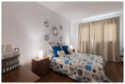 Cama o camas de una habitación en La Casita del Centro