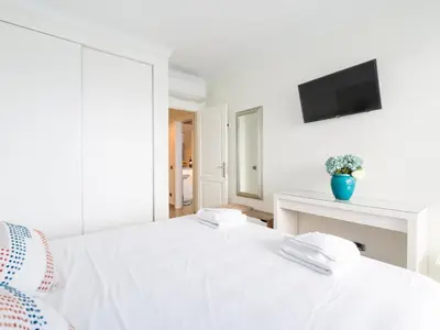 Cama o camas de una habitación en Mogan Beachfront | CarmitAtHome