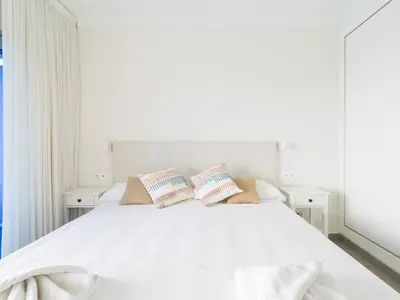 Cama o camas de una habitación en Mogan Beachfront | CarmitAtHome