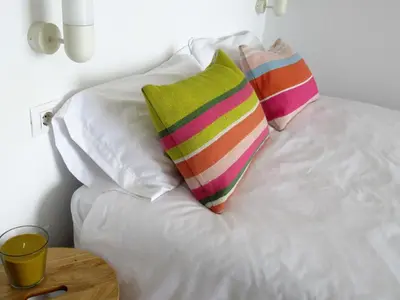 Cama o camas de una habitación en Vivelorural Canteras 208 beach front with wifi