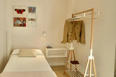 Cama o camas de una habitación en Minimalist Home Canteras Beach