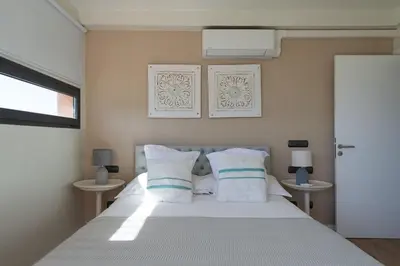 Cama o camas de una habitación en Salobre Villas Lagos