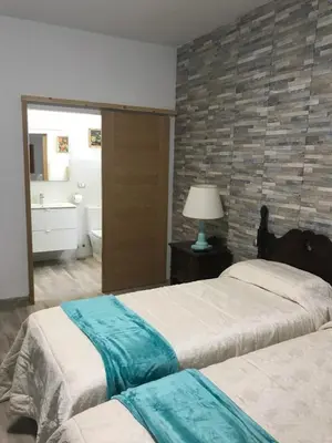 Cama o camas de una habitación en La Socorra Suite Adults Only
