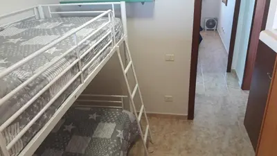 Cama o camas de una habitación en Burrero Seasight