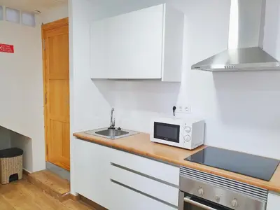 Una cocina o zona de cocina en pozo