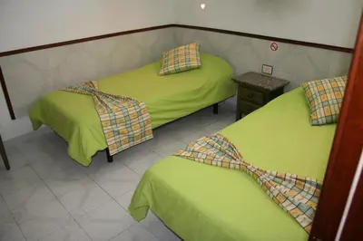 Cama o camas de una habitación en Apartamentos Maba Playa