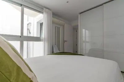 Cama o camas de una habitación en Amplio apartamento recién reformado
