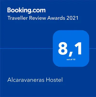 Certificado, premio, señal o documento que está expuesto en Alcaravaneras Hostel