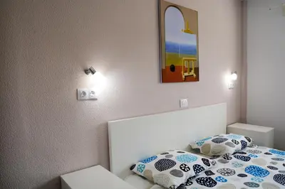 Cama o camas de una habitación en BC Apartment
