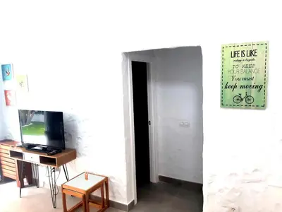 Una televisión o centro de entretenimiento en Tartanas 144 playa del inglés, jumbo