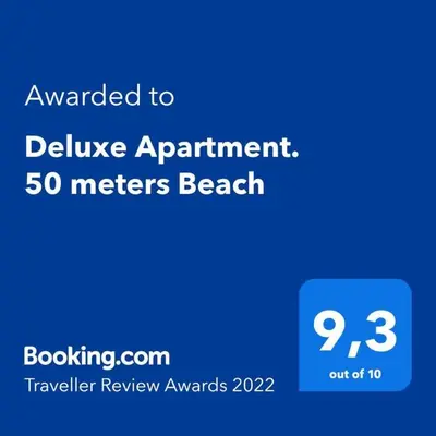 Certificado, premio, señal o documento que está expuesto en Deluxe Apartment. 50 meters Beach