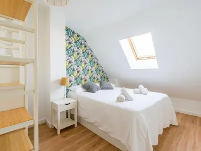 Cama o camas de una habitación en Las Canteras Beach Apartment Sagasta II