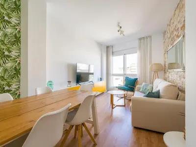 Una televisión o centro de entretenimiento en Las Canteras Beach Apartment Sagasta II