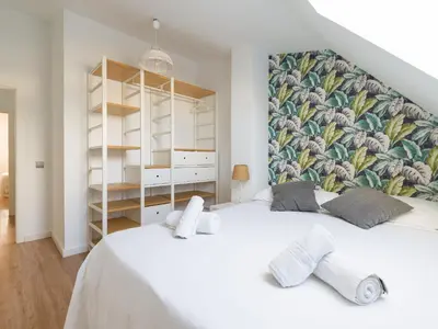Cama o camas de una habitación en Las Canteras Beach Apartment Sagasta II