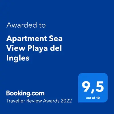 Certificado, premio, señal o documento que está expuesto en Apartment Sea View Playa del Ingles