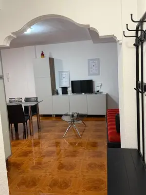 Una televisión o centro de entretenimiento en Apartamento playa arinaga