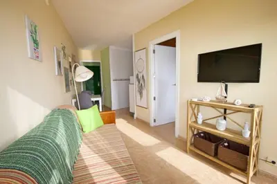 Una televisión o centro de entretenimiento en Centrico apartamento 423 by CASAS COCODRILO