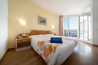 Cama o camas de una habitación en Relaxia Beverly Park