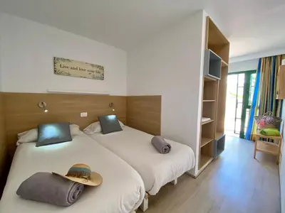 Cama o camas de una habitación en Leticia del Mar Adults Only