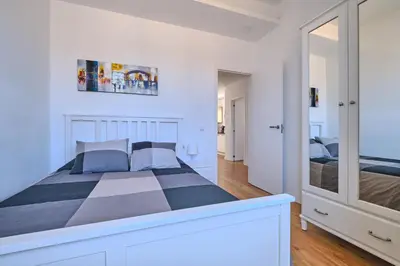 Cama o camas de una habitación en Apartments Vegueta Suite
