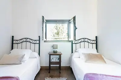 Cama o camas de una habitación en Casa Huertas del Palmar