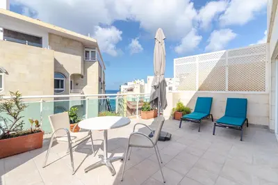 Piscina en o cerca de ESPECTACULAR ATICO CON TERRAZA A 50 MT PLAYA CANTERAS