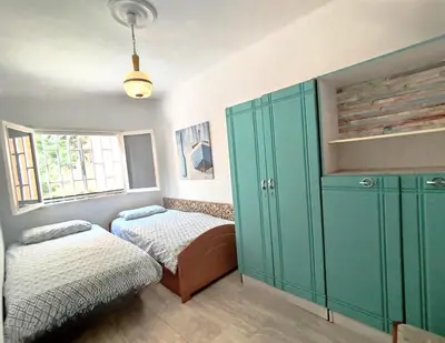 Cama o camas de una habitación en Casa Tinko