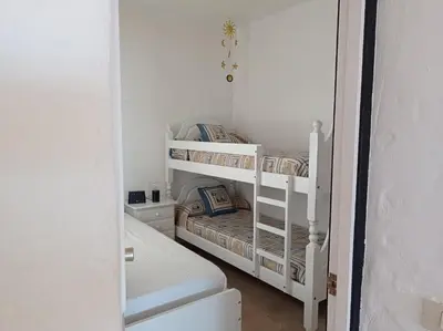 Cama o camas de una habitación en Apartamento Faro de Sardina