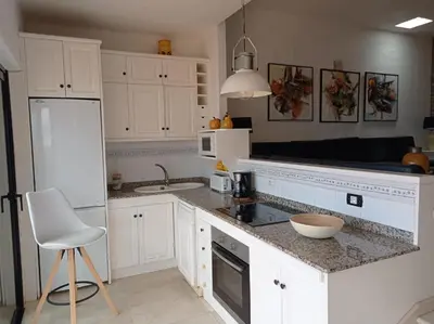 Una cocina o zona de cocina en Apartamento Faro de Sardina
