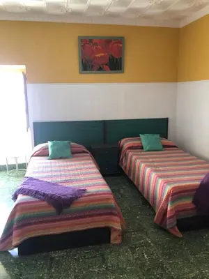 Cama o camas de una habitación en Casa rural la cruz