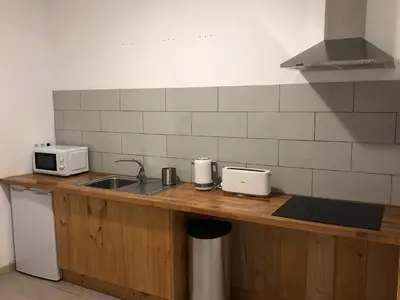 Una cocina o zona de cocina en Columbus Apartments Co-Living