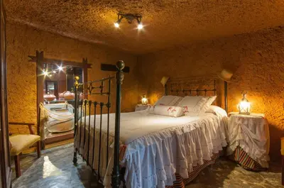Cama o camas de una habitación en La Burbuja
