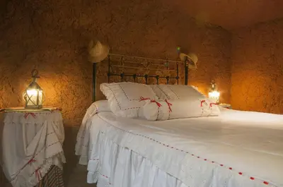 Cama o camas de una habitación en La Burbuja