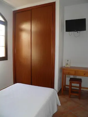 Cama o camas de una habitación en Hostal Albacar