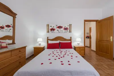 Cama o camas de una habitación en Apartamentosánchez