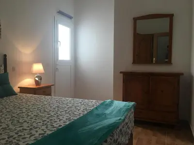 Cama o camas de una habitación en Apartamentosánchez