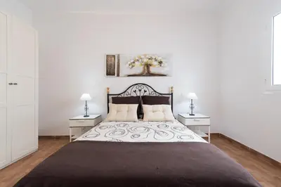 Cama o camas de una habitación en Apartamentosánchez